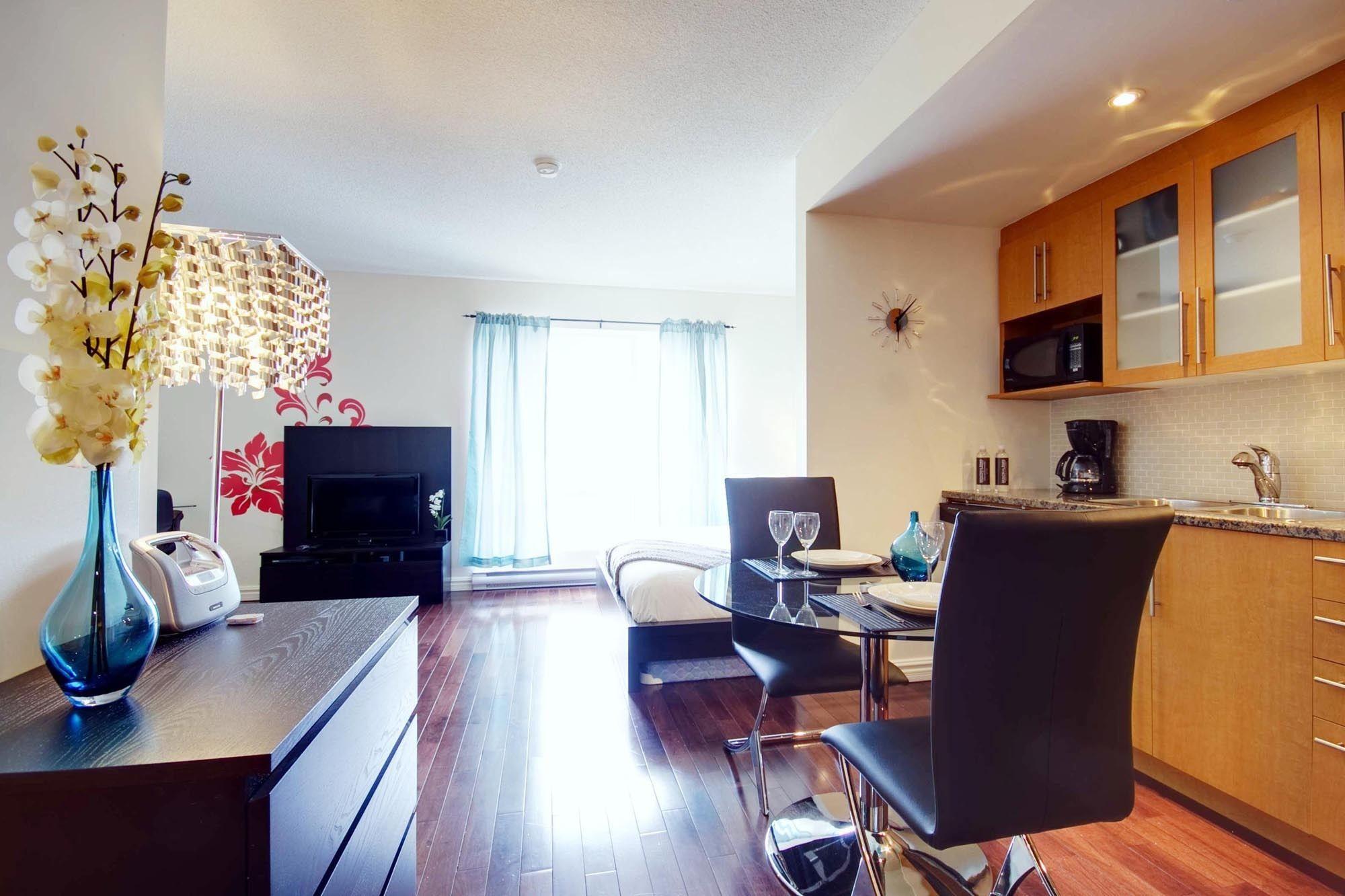 Square Victoria Apartments By Corporatestays มอนทรีอัล ภายนอก รูปภาพ